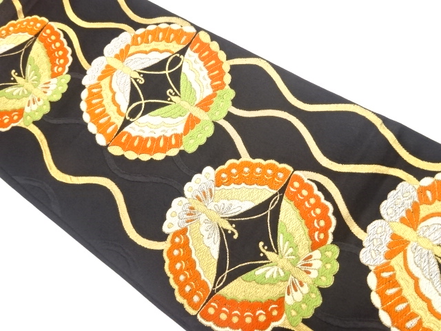 立涌に向かい蝶模様織出し袋帯